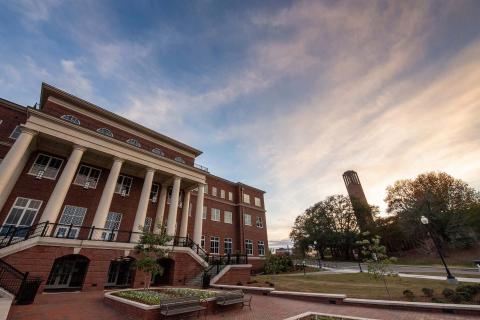 Old Main Academic Center and Chapel Tower at sunset
